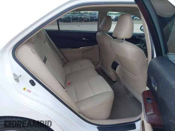 2014 Toyota Camry SE with VIN 4T1BK1FK5EU551196, listed as a IAAI auction lot 41912297 with 104,445 mi miles. Bid and sale history available at carsss.com. Image 8.