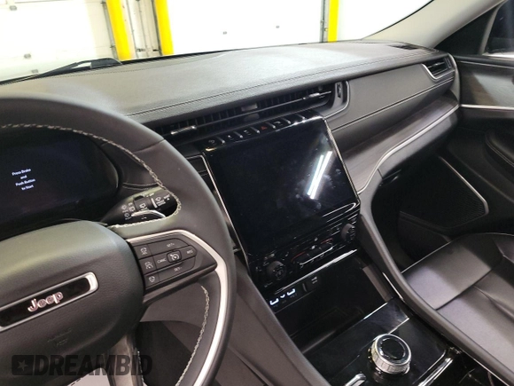 2023 Jeep Grand Cherokee Limited with VIN 1C4RJHBGXPC545550, listed as a IAAI auction lot 42859716 with 34,610 mi miles and . Bid and sale history available at DreamBid. Image 22.