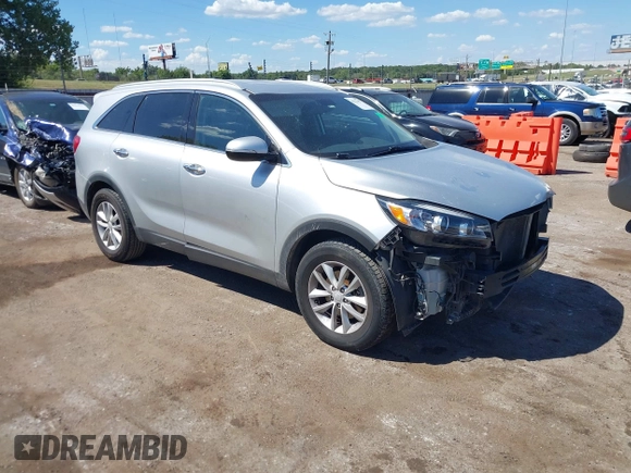 2018 Kia Sorento LX with VIN 5XYPG4A5XJG394663, listed as a IAAI auction lot 40222497 with 125,838 mi miles and . Bid and sale history available at DreamBid. Image 1.
