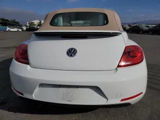 2015 Volkswagen Beetle 1.8T with VIN 3VW517AT6FM802771, listed as a Copart auction lot 72225834 with 128,946 mi miles and Salvage title. Bid and sale history available at DreamBid. Image 6.
