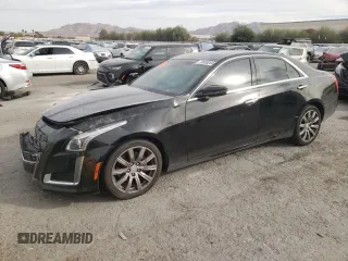 2014 Cadillac CTS Premium AWD z VIN 1G6AZ5SX7E0158072, wystawiony jako Copart lot #79503204 z przebiegiem 86 777 mil mil oraz Szkoda całkowita • Salvage title. Historia ofert i sprzedaży dostępna na DreamBid. Obrazek 1.