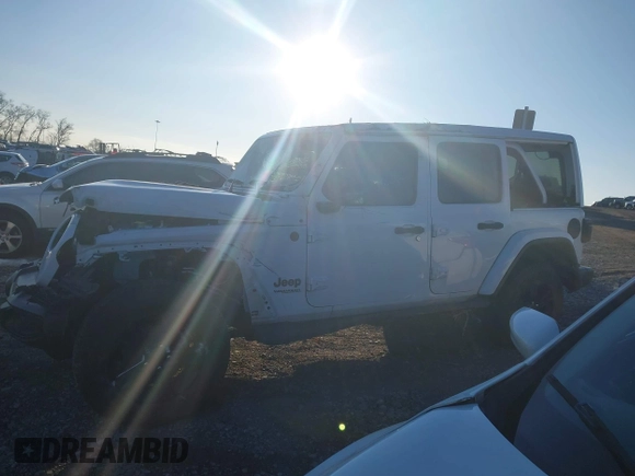 2021 Jeep Wrangler Unlimited Sahara with VIN 1C4HJXEG1MW597905, listed as a IAAI auction lot 41327138 with Not provided miles and . Bid and sale history available at DreamBid. Image 15.