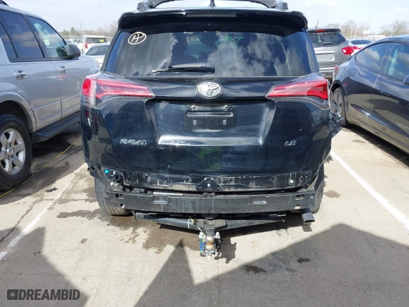 2018 Toyota RAV4 LE with VIN 2T3ZFREV9JW457062, listed as a IAAI auction lot 41696609 with 96,716 mi miles. Bid and sale history available at carsss.com. Image 17.