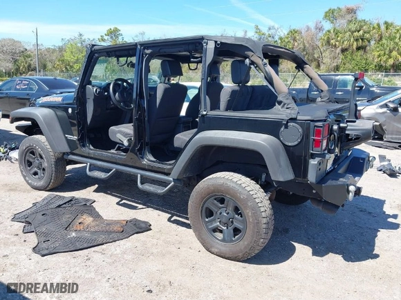 2010 Jeep Wrangler Unlimited Sport with VIN 1J4BA3H19AL229369, listed as a IAAI auction lot 41699172 with 125,021 mi miles. Bid and sale history available at carsss.com. Image 3.