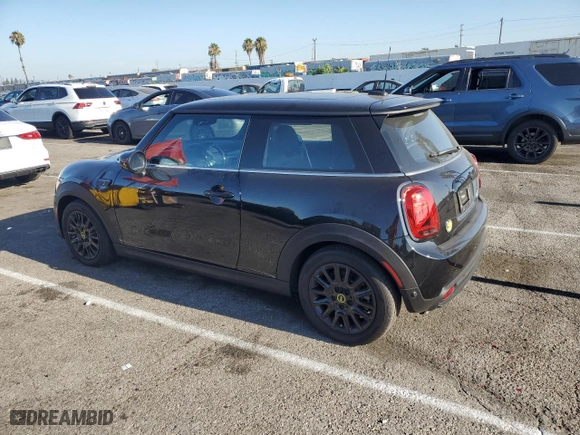 2023 MINI Hardtop 2 Door Cooper SE Signature with VIN WMW13DJ00P2T81586, listed as a Copart auction lot 65493294 with 5,063 mi miles and Salvage Title. Bid and sale history available at carsss.com. Image 2.