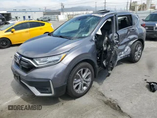 2022 Honda CR-V Touring z VIN 7FARW2H96NE052072, wystawiony jako Copart lot #52214465 z przebiegiem 63 832 mil mil oraz Szkoda całkowita • Salvage title. Historia ofert i sprzedaży dostępna na DreamBid. Obrazek 1.
