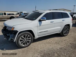 2017 Jeep Grand Cherokee Overland with VIN 1C4RJECGXHC868236, listed as a Copart auction lot 72374654 with 99,528 mi miles and Salvage Title. Bid and sale history available at carsss.com. Image 1.