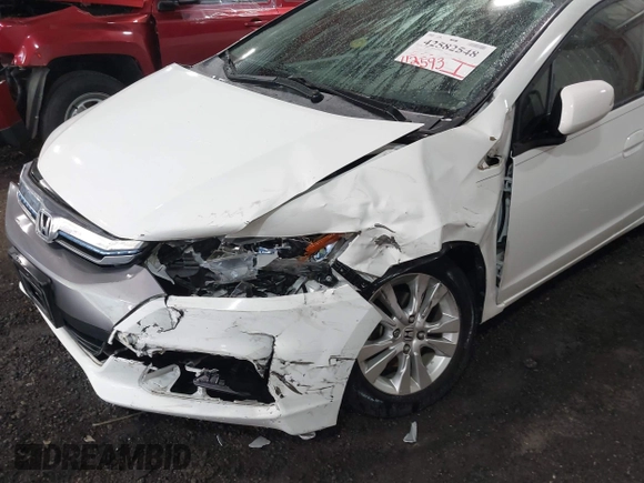 2012 Honda Insight EX with VIN JHMZE2H71CS003132, listed as a IAAI auction lot 42582548 with 112,593 mi miles and . Bid and sale history available at DreamBid. Image 6.