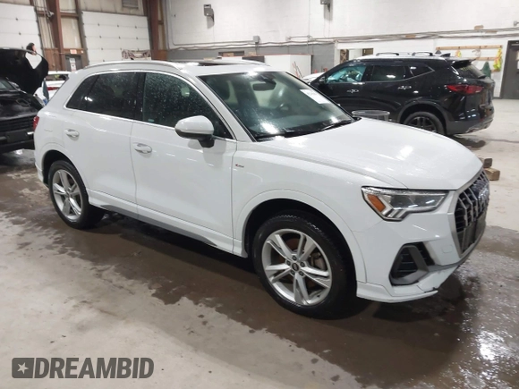 2021 Audi Q3 S line Premium Plus with VIN WA1EECF31M1060356, listed as a IAAI auction lot 42242850 with 83,380 mi miles and . Bid and sale history available at DreamBid. Image 1.