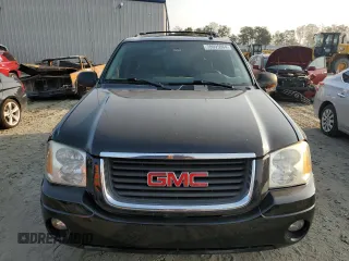 2004 GMC Envoy SLT with VIN 1GKDT13S942407244, listed as a Copart auction lot 70995064 with 162,676 mi miles and Salvage Title. Bid and sale history available at carsss.com. Image 5.