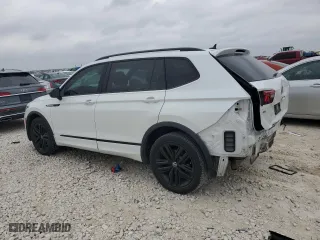 2022 Volkswagen Tiguan SE R-Line Black with VIN 3VVCB7AX0NM169257, listed as a Copart auction lot 43129745 with 59,517 mi miles and Salvage Title. Bid and sale history available at carsss.com. Image 2.