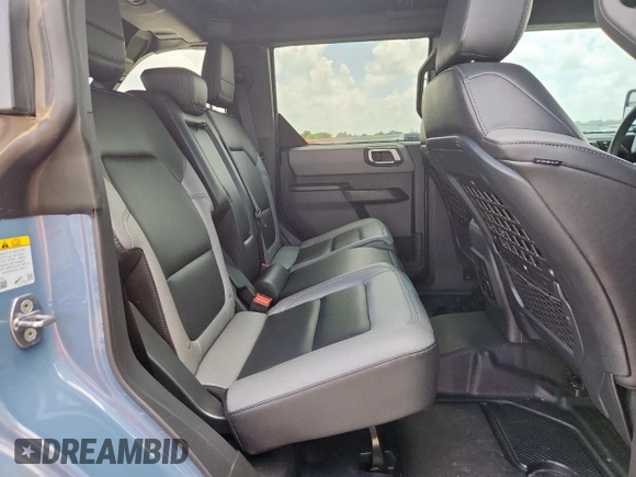2024 Ford Bronco Big Bend with VIN 1FMDE7BH7RLA03788, listed as a Copart auction lot 65085065 with 10,597 mi miles and Salvage title. Bid and sale history available at DreamBid. Image 11.
