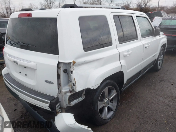 2016 Jeep Patriot Latitude with VIN 1C4NJPFAXGD749306, listed as a IAAI auction lot 41474439 with 94,767 mi miles and . Bid and sale history available at DreamBid. Image 4.