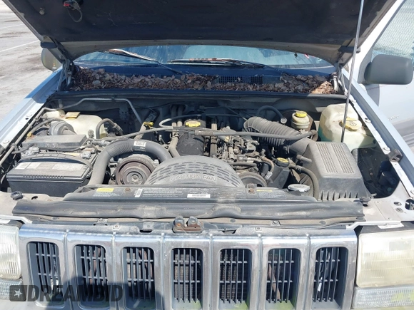 1996 Jeep Grand Cherokee Laredo with VIN 1J4FX58S2TC397006, listed as a IAAI auction lot 41836108 with 136,742 mi miles. Bid and sale history available at carsss.com. Image 10.