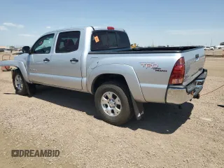 2006 Toyota Tacoma with VIN 5TELU42N76Z283409, listed as a Copart auction lot 61391785 with 77,799 mi miles and Salvage title. Bid and sale history available at DreamBid. Image 2.