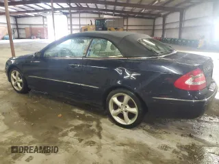 2005 Mercedes-Benz CLK 320 with VIN WDBTK65G45T048797, listed as a Copart auction lot 71617034 with 84,006 mi miles and Salvage Title. Bid and sale history available at carsss.com. Image 2.