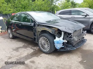 2016 Ford Fusion Titanium с VIN 3FA6P0K98GR263421, выставлен на аукционе IAAI как лот 42326839 с пробегом 97 511 миль миль и . История ставок и продаж доступна на DreamBid. Изображение 1.