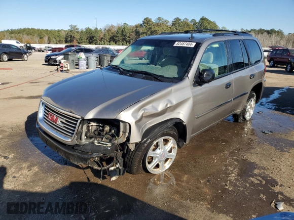 2009 GMC Envoy SLE with VIN 1GKDS33SX92131159, listed as a Copart auction lot 82487404 with 224,391 mi miles and Salvage Title. Bid and sale history available at carsss.com. Image 1.