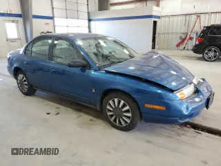 2001 Saturn SL z VIN 1G8ZK52791Z210421, wystawiony jako Copart lot #48808595 z przebiegiem 98 960 mil mil oraz Szkoda całkowita • Salvage title. Historia ofert i sprzedaży dostępna na DreamBid. Obrazek 4.