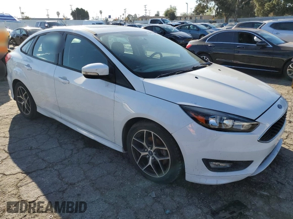 2016 Ford Focus SE with VIN 1FADP3F26GL336032, listed as a Copart auction lot 48334005 with 107,527 mi miles and Clean title. Bid and sale history available at DreamBid. Image 4.
