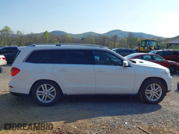2014 Mercedes-Benz GL-Class GL 450 with VIN 4JGDF7CE5EA430524, listed as a IAAI auction lot 42020941 with 84,544 mi miles. Bid and sale history available at carsss.com. Image 13.