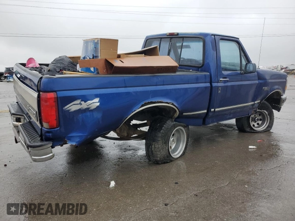 1996 Ford F-150 with VIN 1FTEF14N2TNA17129, listed as a Copart auction lot 52091965 with 243,778 mi miles and Salvage Title. Bid and sale history available at DreamBid. Image 3.