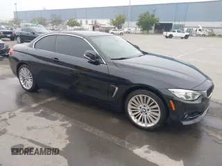 2015 BMW 4 Series 435i xDrive with VIN WBA3T7C51F5A36764, listed as a IAAI auction lot 41658047 with 97,935 mi miles and . Bid and sale history available at carsss.com. Image 1.
