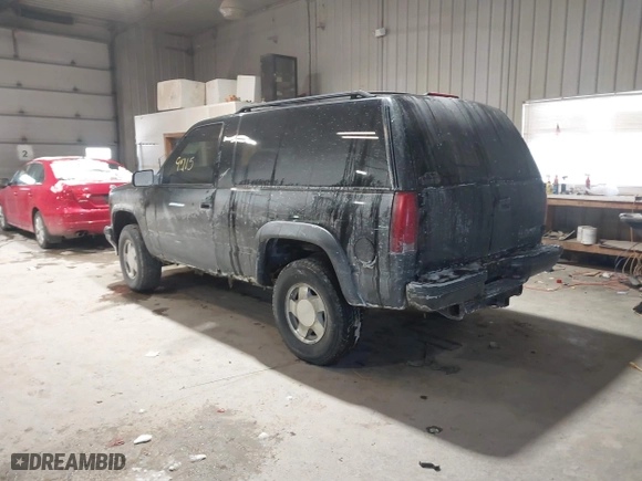 1998 Chevrolet Tahoe with VIN 3GNEK18R7WG122892, listed as a IAAI auction lot 41589715 with 195,653 mi miles. Bid and sale history available at carsss.com. Image 3.