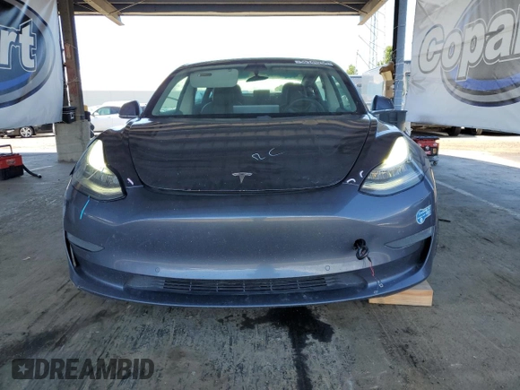 2020 Tesla Model 3 Standard Range Plus z VIN 5YJ3E1EA3LF803624, wystawiony jako Copart lot #56145255 z przebiegiem 149 398 mil mil oraz Szkoda całkowita • Salvage title. Historia ofert i sprzedaży dostępna na DreamBid. Obrazek 5.