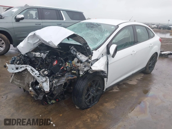 2016 Ford Focus SE z VIN 1FADP3F27GL326593, wystawiony jako IAAI lot #41024761 z przebiegiem 131 200 mil mil oraz . Historia ofert i sprzedaży dostępna na DreamBid. Obrazek 2.