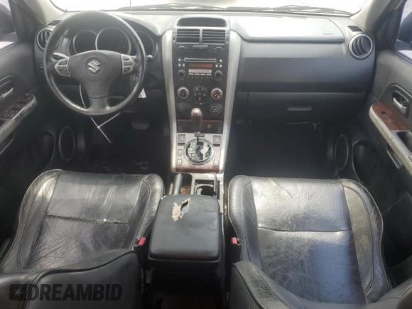 2006 Suzuki Grand Vitara Luxury с VIN JS3TE947264102168, выставлен на аукционе Copart как лот 71726254 с пробегом 276 789 миль миль и Списание • Salvage title. История ставок и продаж доступна на DreamBid. Изображение 8.