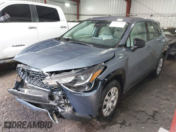 2022 Toyota Corolla Cross L with VIN 7MUAAAAG9NV034659, listed as a IAAI auction lot 42125356 with 14,631 mi miles and . Bid and sale history available at DreamBid. Image 17.