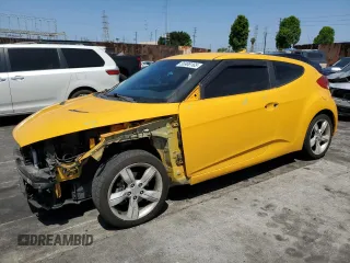 2015 Hyundai Veloster z VIN KMHTC6AD7FU232505, wystawiony jako Copart lot #56908165 z przebiegiem 81 829 mil mil oraz Szkoda całkowita • Salvage title. Historia ofert i sprzedaży dostępna na DreamBid. Obrazek 1.