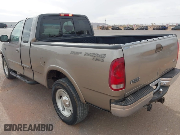2001 Ford F-150 XL with VIN 2FTRX18L61CA36907, listed as a IAAI auction lot 41906933 with 317,857 mi miles. Bid and sale history available at carsss.com. Image 3.