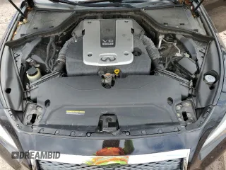 2015 Infiniti Q50 z VIN JN1BV7AR7FM421993, wystawiony jako Copart lot #60709065 z przebiegiem Nie podano mil oraz Szkoda całkowita • Salvage title. Historia ofert i sprzedaży dostępna na DreamBid. Obrazek 11.