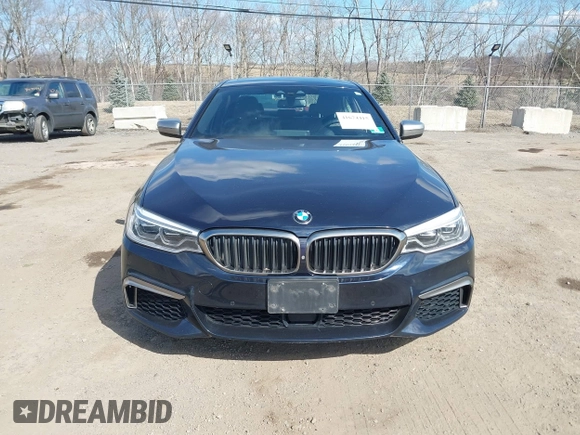 2018 BMW 5 Series M550i xDrive with VIN WBAJB9C52JB035930, listed as a IAAI auction lot 41674415 with 56,294 mi miles and . Bid and sale history available at DreamBid. Image 12.