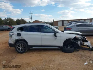 2018 BMW X1 sDrive28i with VIN WBXHU7C37J5H39401, listed as a IAAI auction lot 41421610 with 94,576 mi miles. Bid and sale history available at carsss.com. Image 13.