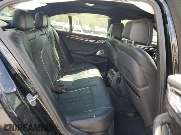 2018 BMW 5 Series M550i xDrive with VIN WBAJB9C55JB049384, listed as a Copart auction lot 54934435 with 79,061 mi miles and Non Repairable. Bid and sale history available at DreamBid. Image 10.