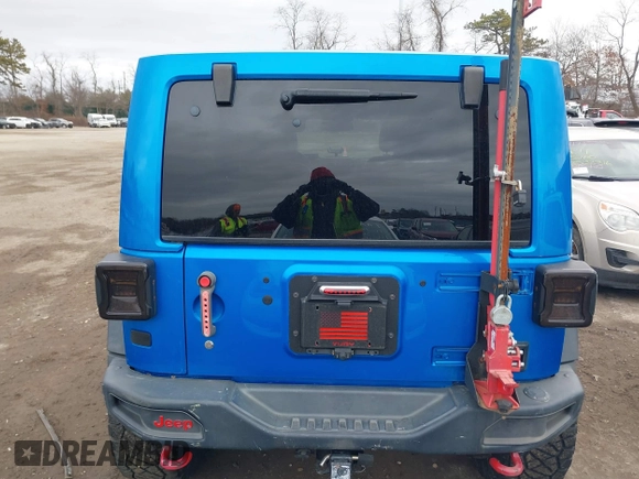 2016 Jeep Wrangler Unlimited Rubicon with VIN 1C4BJWFG2GL192074, listed as a IAAI auction lot 41598861 with 70,000 mi miles and . Bid and sale history available at DreamBid. Image 16.