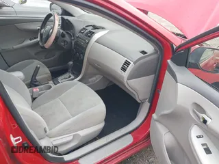 2010 Toyota Corolla with VIN 1NXBU4EE9AZ339984, listed as a IAAI auction lot 42133947 with 158,479 mi miles. Bid and sale history available at carsss.com. Image 5.