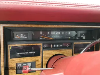 1985 Cadillac Eldorado z VIN 1G6EL5782FE634074, wystawiony jako Copart lot #44520964 z przebiegiem 74 425 mil mil oraz Szkody całkowita. Historia ofert i sprzedaży dostępna na DreamBid. Obrazek 9.