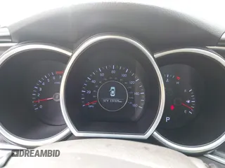 2015 Kia Optima LX with VIN 5XXGM4A71FG356034, listed as a IAAI auction lot 42402142 with 131,376 mi miles and . Bid and sale history available at DreamBid. Image 7.