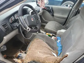 2003 Saturn LS z VIN 1G8JU54F13Y556015, wystawiony jako Copart lot #67447604 z przebiegiem Nie podano mil oraz Szkody całkowita. Historia ofert i sprzedaży dostępna na DreamBid. Obrazek 7.