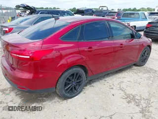 2017 Ford Focus SE z VIN 1FADP3F23HL313857, wystawiony jako IAAI lot #42181530 z przebiegiem 93 478 mil mil oraz . Historia ofert i sprzedaży dostępna na DreamBid. Obrazek 4.