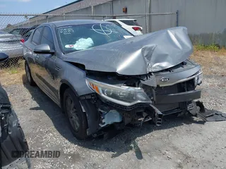 2018 Kia Optima LX z VIN 5XXGT4L31JG194203, wystawiony jako IAAI lot #42338579 z przebiegiem 116 223 mil mil oraz . Historia ofert i sprzedaży dostępna na DreamBid. Obrazek 1.