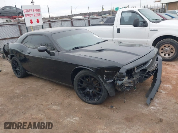 2013 Dodge Challenger SXT z VIN 2C3CDYAGXDH718768, wystawiony jako IAAI lot #41339735 z przebiegiem 187 052 mil mil oraz . Historia ofert i sprzedaży dostępna na DreamBid. Obrazek 14.