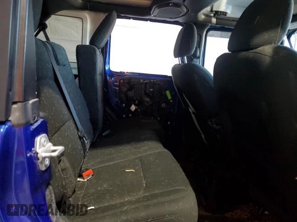 2020 Jeep Wrangler Unlimited Black and Tan with VIN 1C4HJXDG1LW267312, listed as a Copart auction lot 49658135 with 66,624 mi miles and Salvage title. Bid and sale history available at DreamBid. Image 10.