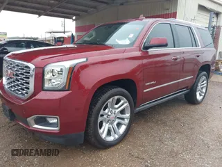 2020 GMC Yukon Denali with VIN 1GKS2CKJ5LR129592, listed as a IAAI auction lot 39806304 with 71,125 mi miles. Bid and sale history available at carsss.com. Image 2.
