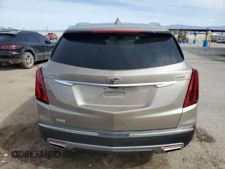 2022 Cadillac XT5 FWD Premium Luxury z VIN 1GYKNCRS9NZ180043, wystawiony jako Copart lot #51352195 z przebiegiem 12 399 mil mil oraz Szkoda całkowita • Salvage title. Historia ofert i sprzedaży dostępna na DreamBid. Obrazek 6.