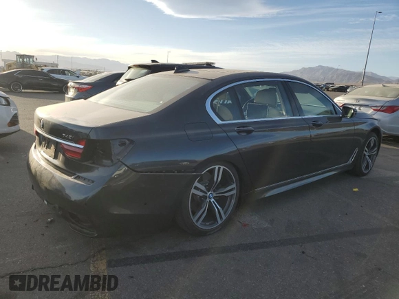 2016 BMW 7 Series 740i z VIN WBA7E2C53GG504611, wystawiony jako Copart lot #42253395 z przebiegiem 35 965 mil mil oraz Szkoda całkowita • Salvage title. Historia ofert i sprzedaży dostępna na DreamBid. Obrazek 3.